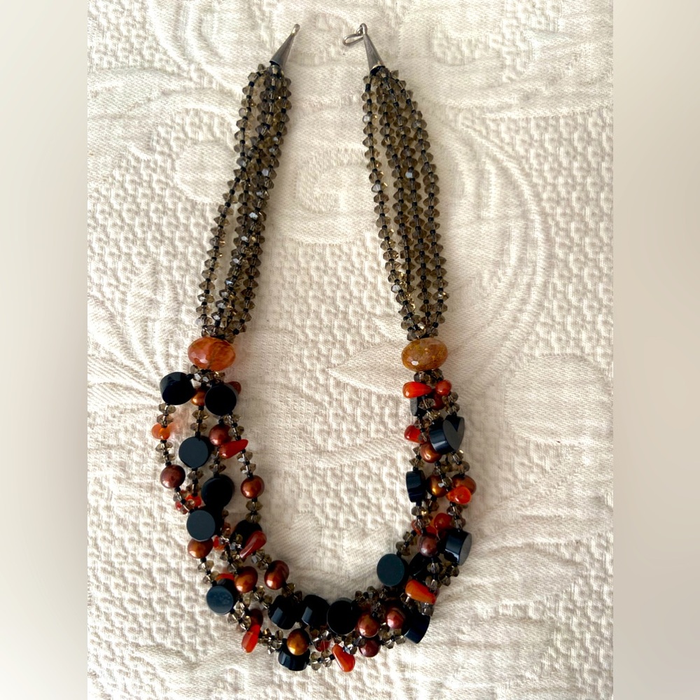 One of a kind, four strand crystal, cultured pearl, and glass bead necklace.